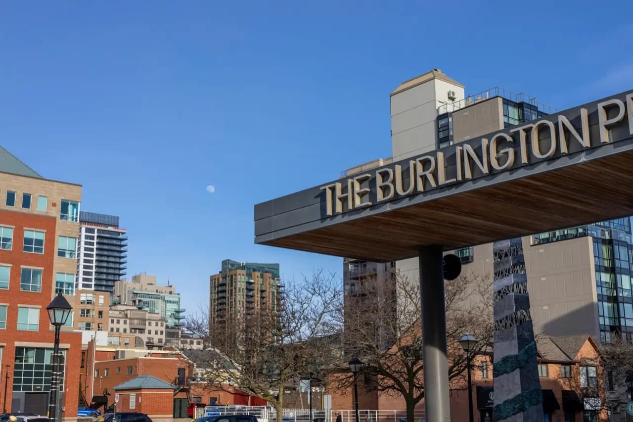The Burlington sign and downtown Burlington, Ontario cityscape — lawn care service area