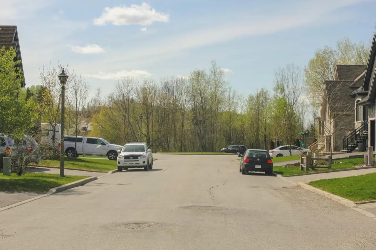 Residential neighbourhood in Laval, Quebec with suburban homes — lawn care service area