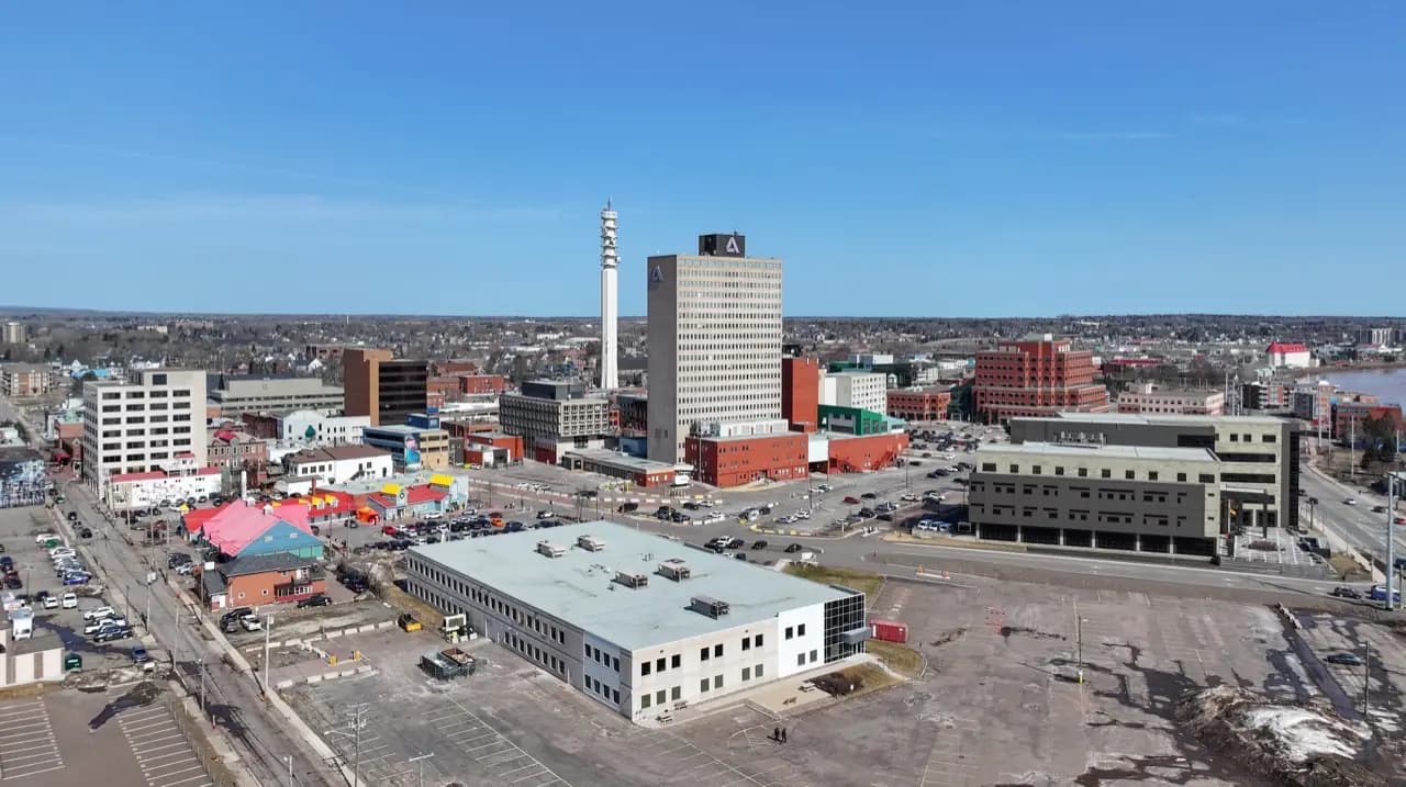 Moncton, New Brunswick downtown with Petitcodiac River — lawn care service area