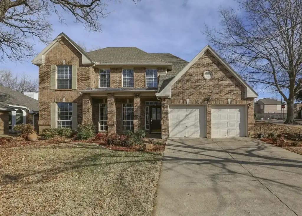 House with excellent curb appeal and manicured lawn